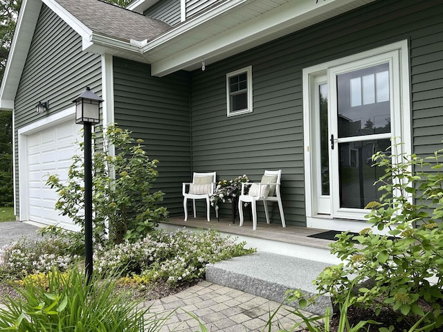 76 Cottonwood Way, Manchester, NH 03102 - view of patio featuring a garage