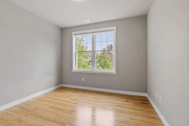 76 Cottonwood Way, Manchester, NH 03102 - empty room featuring light wood-style flooring and baseboards
