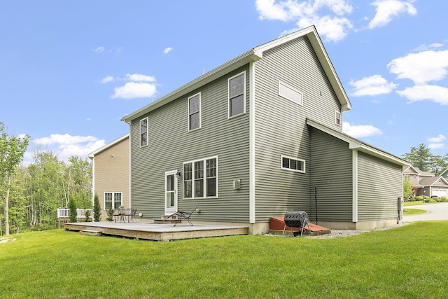 76 Cottonwood Way, Manchester, NH 03102 - back of property featuring a wooden deck and a yard