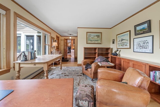 372 Brill Rd, Landaff, NH 03785 - living area with a baseboard heating unit, ornamental molding, and wood finished floors
