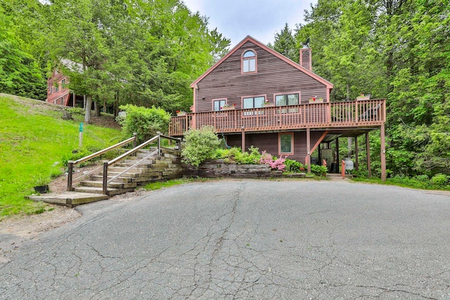 47 Trailside Ln Unit 18, Francestown, NH 03043 - chalet / cabin featuring a chimney, a deck, and stairs
