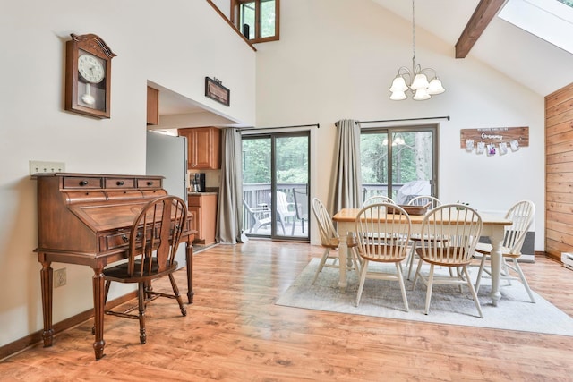 47 Trailside Ln Unit 18, Francestown, NH 03043 - dining room with a chandelier, high vaulted ceiling, light wood-style floors, and beamed ceiling