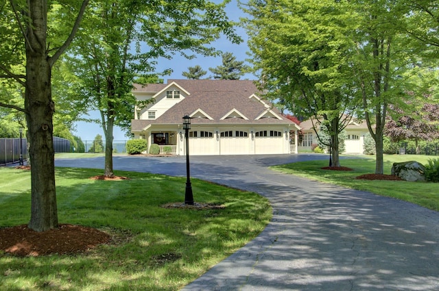 194 Maquam Shore Rd, Swanton, VT 05488 - view of front of home featuring driveway, a garage, and a shingled roof