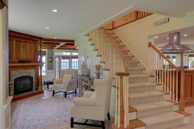 194 Maquam Shore Rd, Swanton, VT 05488 - stairway featuring recessed lighting, a high end fireplace, and ornamental molding