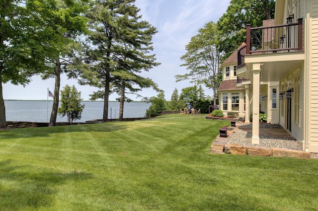 194 Maquam Shore Rd, Swanton, VT 05488 - view of grassy yard with a balcony and a water view