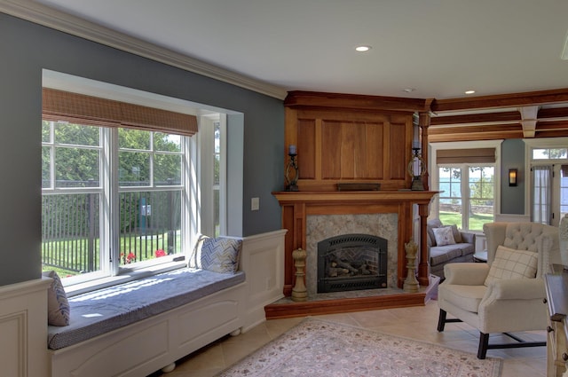 194 Maquam Shore Rd, Swanton, VT 05488 - living room with light tile patterned floors, a fireplace, crown molding, and recessed lighting