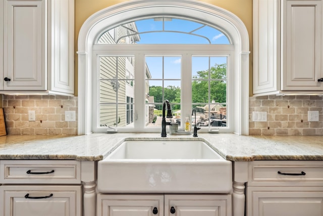 32 Burnham Rd, Windham, NH 03087 - kitchen with backsplash and light stone counters
