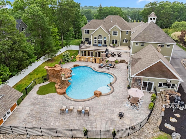 32 Burnham Rd, Windham, NH 03087 - view of pool featuring a fenced backyard, a patio area, and outdoor dining space