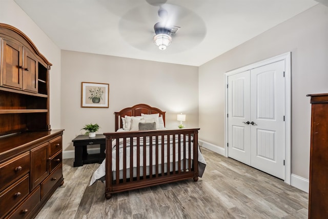 32 Burnham Rd, Windham, NH 03087 - bedroom featuring light wood-style floors, a closet, and a ceiling fan