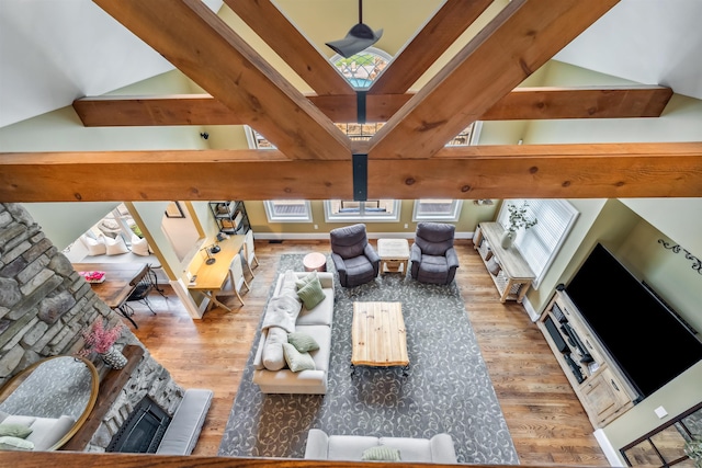 32 Burnham Rd, Windham, NH 03087 - living area featuring wood finished floors and a fireplace