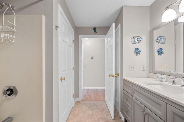121 Forest Dr Unit 4, Montpelier, VT 05602 - full bath with vanity and baseboards