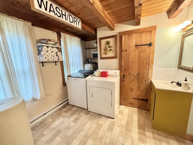 6 Alfano Dr, Enfield, NH 03748 - washroom with a baseboard heating unit, washer and dryer, wood ceiling, and light wood-style floors