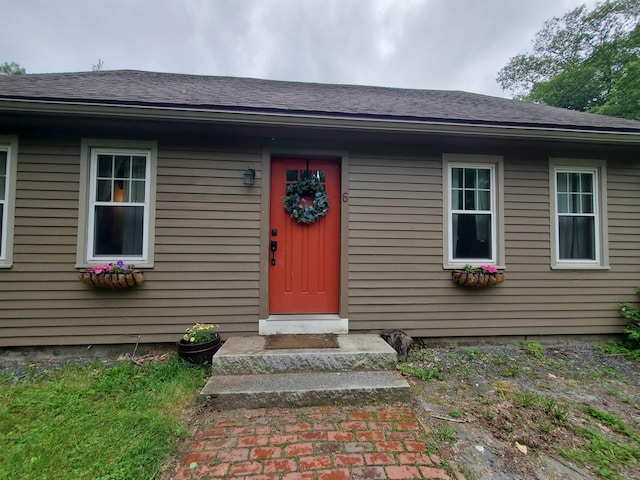 6 Alfano Dr, Enfield, NH 03748 - view of exterior entry featuring roof with shingles