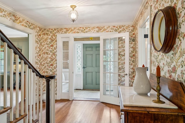 84 S Main St, Hanover, NH 03755 - entryway with wallpapered walls, stairway, light wood-style floors, plenty of natural light, and crown molding