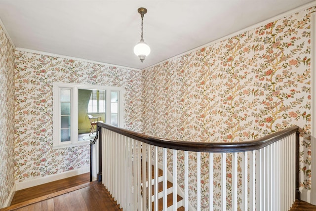 84 S Main St, Hanover, NH 03755 - corridor featuring dark wood-style flooring, crown molding, wallpapered walls, and an upstairs landing