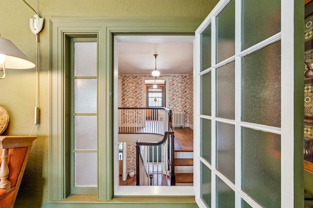 84 S Main St, Hanover, NH 03755 - hall featuring radiator, an upstairs landing, and wallpapered walls