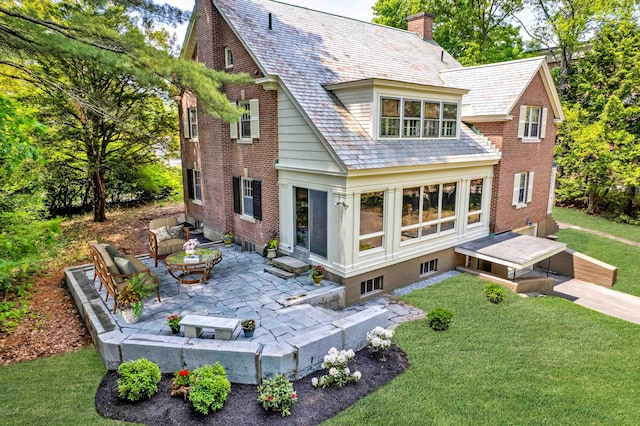 84 S Main St, Hanover, NH 03755 - back of property featuring a patio area, a high end roof, a yard, a chimney, and outdoor lounge area