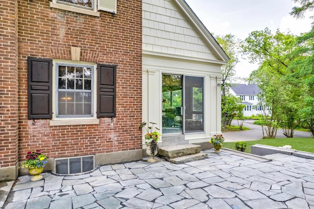 84 S Main St, Hanover, NH 03755 - property entrance with brick siding and a patio