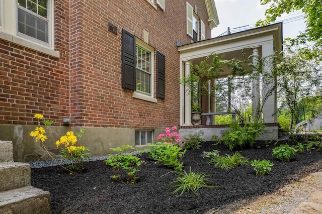 84 S Main St, Hanover, NH 03755 - view of home's exterior featuring brick siding