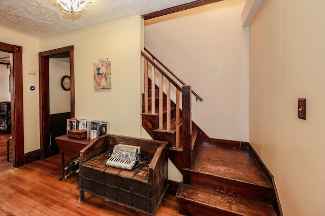 26 Verona St, Nashua, NH 03060 - stairway featuring hardwood / wood-style floors and baseboards