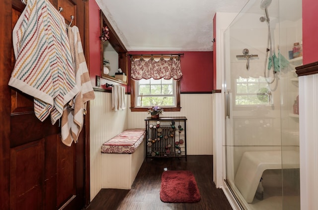 26 Verona St, Nashua, NH 03060 - bathroom with wood finished floors, a stall shower, and wainscoting