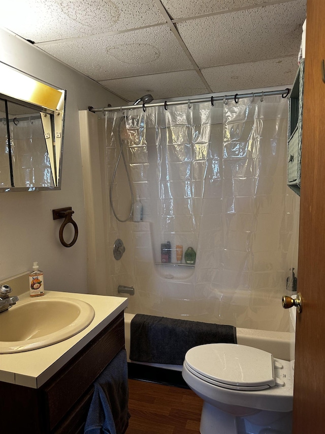 53 High St, Middlebury, VT 05753 - bathroom featuring wood finished floors, shower / tub combo with curtain, vanity, and a paneled ceiling
