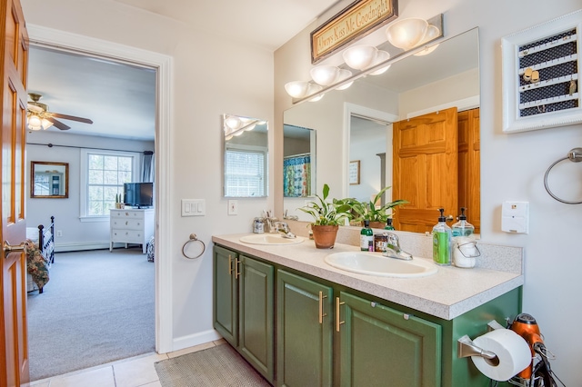 290 Elm St, Littleton, NH 03561 - full bath featuring double vanity, tile patterned flooring, and ceiling fan