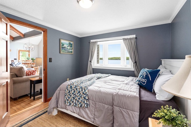 20 Bennett Cir, Antrim, NH 03440 - bedroom featuring a chandelier, wood finished floors, and crown molding