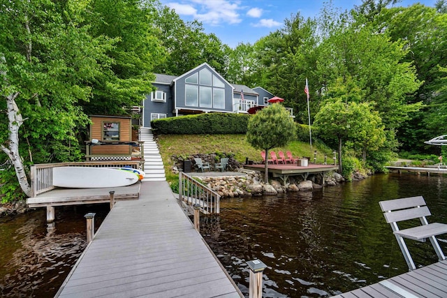 20 Bennett Cir, Antrim, NH 03440 - dock area featuring a water view and view of wooded area