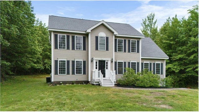 114 Byam Rd, New Boston, NH 03070 - colonial inspired home featuring a front lawn and roof with shingles