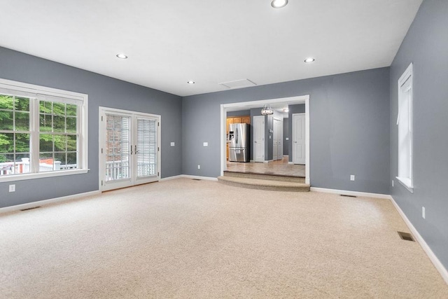 114 Byam Rd, New Boston, NH 03070 - unfurnished room with light colored carpet, recessed lighting, and french doors