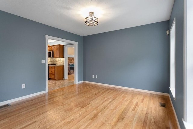 114 Byam Rd, New Boston, NH 03070 - unfurnished room featuring light wood finished floors and baseboards