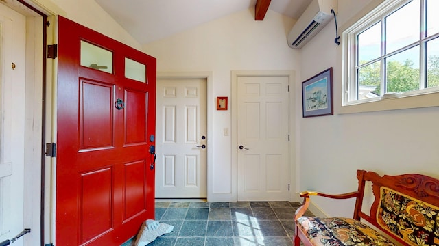 1074 N Hollow Rd, Rochester, VT 05767 - entrance foyer featuring a wall mounted air conditioner and dark stone finish flooring