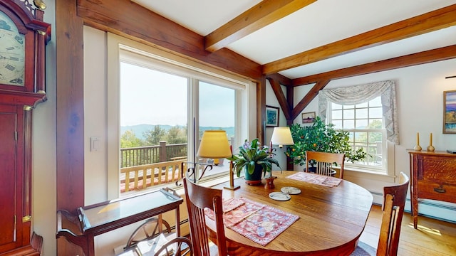1074 N Hollow Rd, Rochester, VT 05767 - dining room with beam ceiling, wood finished floors, and a mountain view