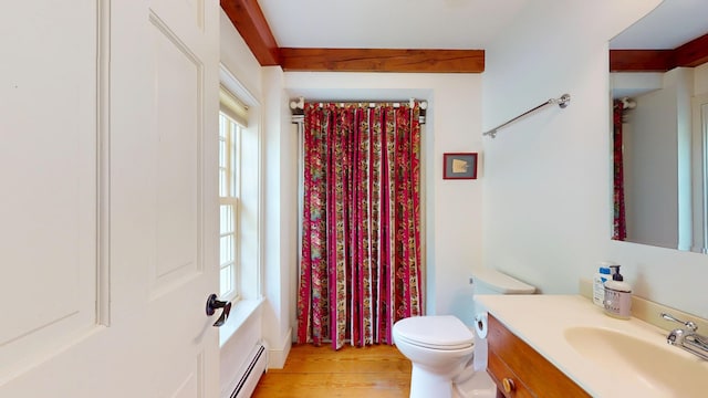 1074 N Hollow Rd, Rochester, VT 05767 - full bathroom with vanity, wood finished floors, a shower with curtain, and baseboard heating