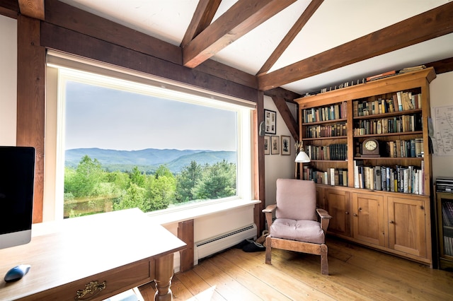 1074 N Hollow Rd, Rochester, VT 05767 - living area featuring baseboard heating and light wood-type flooring