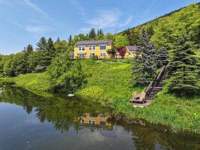 1074 N Hollow Rd, Rochester, VT 05767 - aerial view of property and surrounding area featuring a nearby body of water and a forest