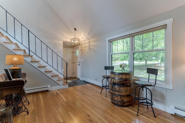 12 Garrison Ln, Madbury, NH 03823 - entryway with a baseboard heating unit, hardwood / wood-style floors, stairs, and baseboard heating