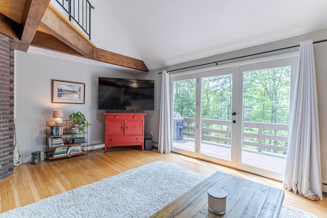 12 Garrison Ln, Madbury, NH 03823 - living room featuring vaulted ceiling and hardwood / wood-style floors