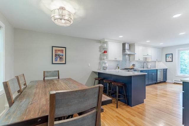 12 Garrison Ln, Madbury, NH 03823 - dining room with a baseboard heating unit, light wood-style flooring, and recessed lighting