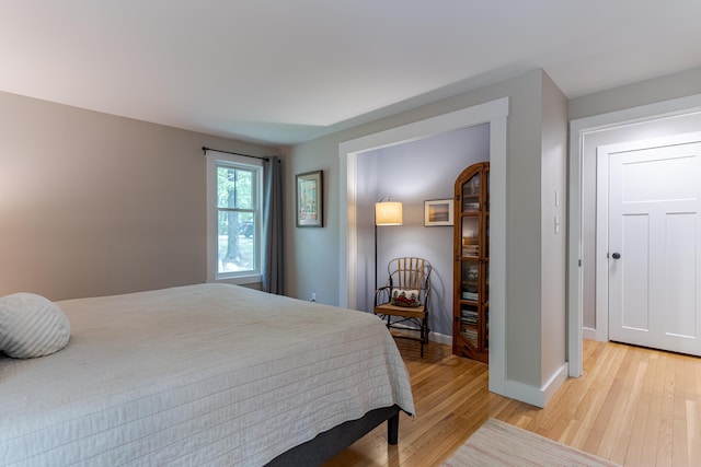 12 Garrison Ln, Madbury, NH 03823 - bedroom with light wood finished floors and baseboards