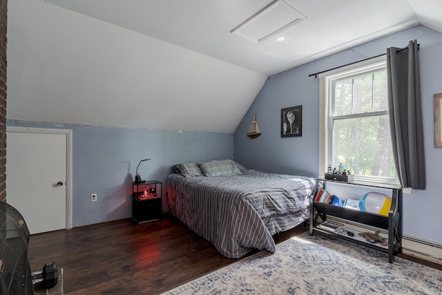 12 Garrison Ln, Madbury, NH 03823 - bedroom with attic access, lofted ceiling, and wood finished floors
