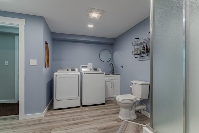 12 Garrison Ln, Madbury, NH 03823 - laundry area with washer and dryer, light wood-style floors, and recessed lighting