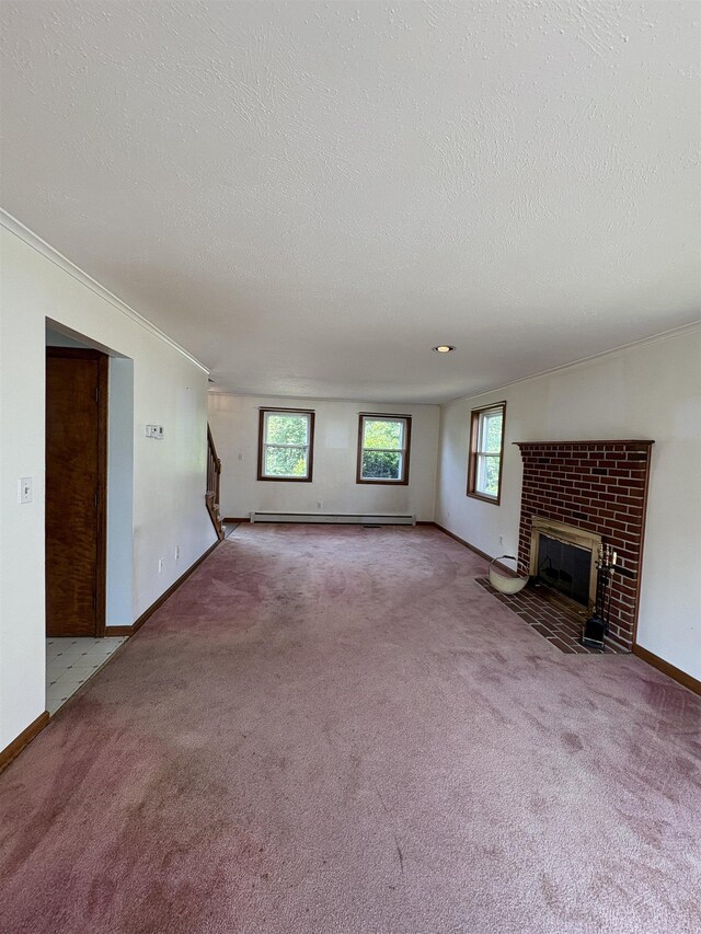 28 Old Orchard Way, Manchester, NH 03103 - unfurnished living room with healthy amount of natural light, stairway, carpet flooring, a fireplace, and a textured ceiling