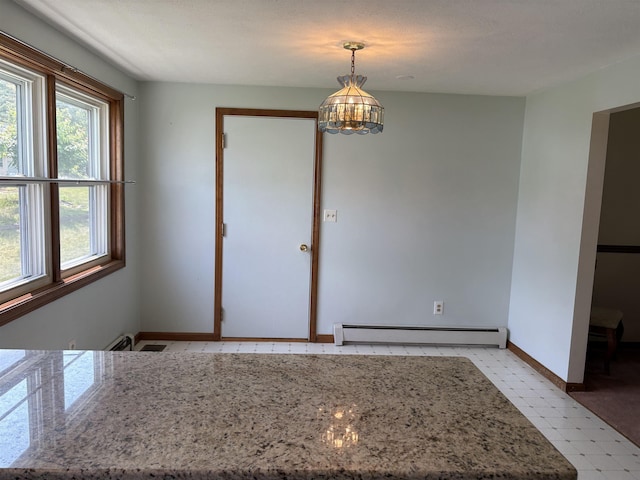 28 Old Orchard Way, Manchester, NH 03103 - unfurnished dining area with baseboard heating, light floors, and a chandelier