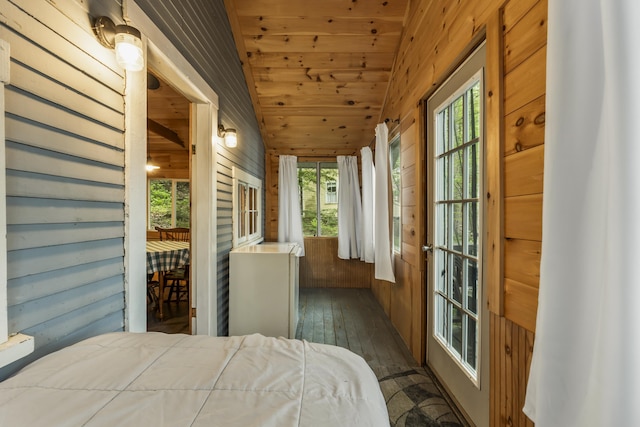23 E Shore Dr, Greene, ME 04236 - bedroom featuring hardwood / wood-style floors, wood ceiling, wood walls, and vaulted ceiling