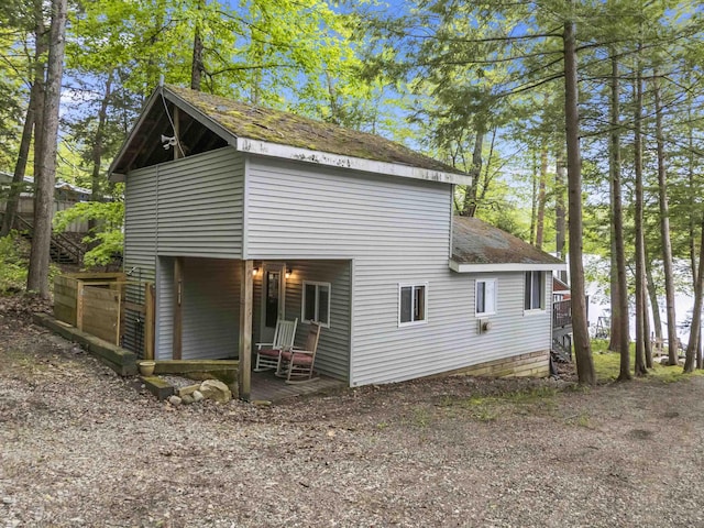 23 E Shore Dr, Greene, ME 04236 - view of property exterior featuring a shingled roof