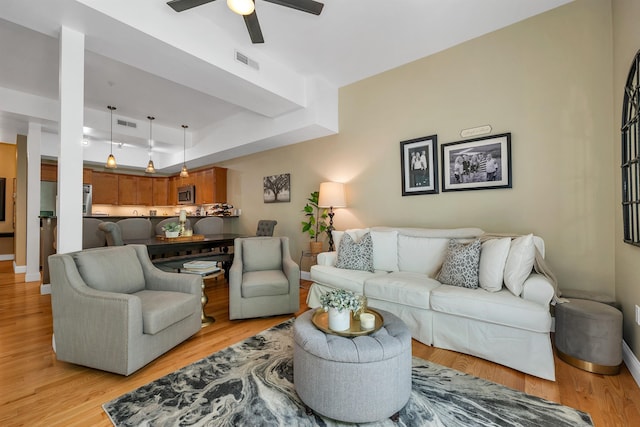 116 Piscataqua Rd Unit C, Durham, NH 03824 - living room with light wood-style flooring and ceiling fan