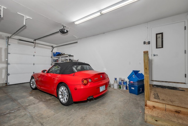 116 Piscataqua Rd Unit C, Durham, NH 03824 - garage featuring a garage door opener