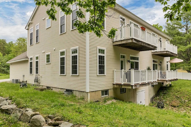 116 Piscataqua Rd Unit C, Durham, NH 03824 - view of side of property with a balcony and a wooden deck
